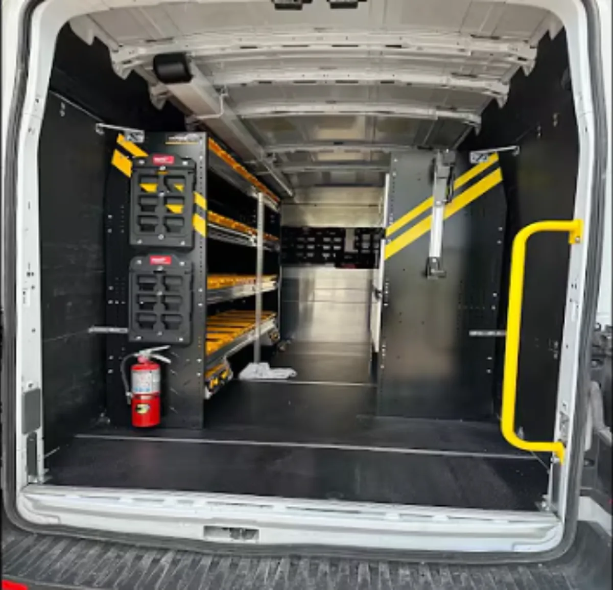 Organized shelving and tools inside a Sun City Pro Plumbing service van